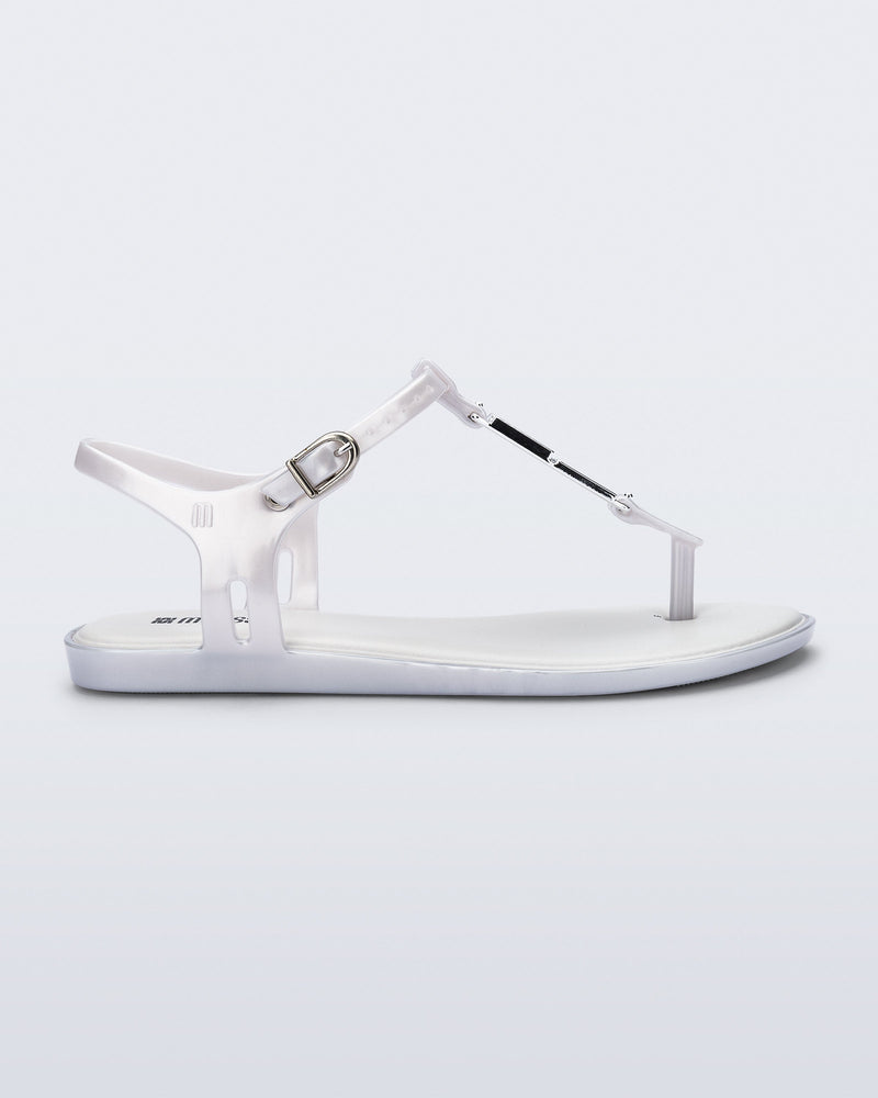 Side view of a pearly white Solar M Chic sandal