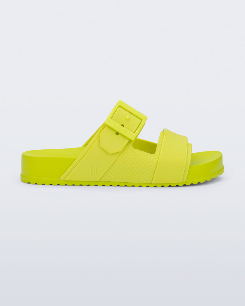 Side view of a green Cozy Connection slide