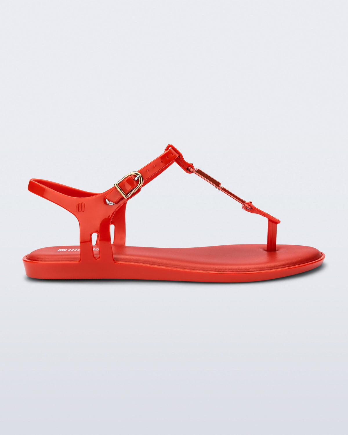 Side view of a red Solar M Chic sandal