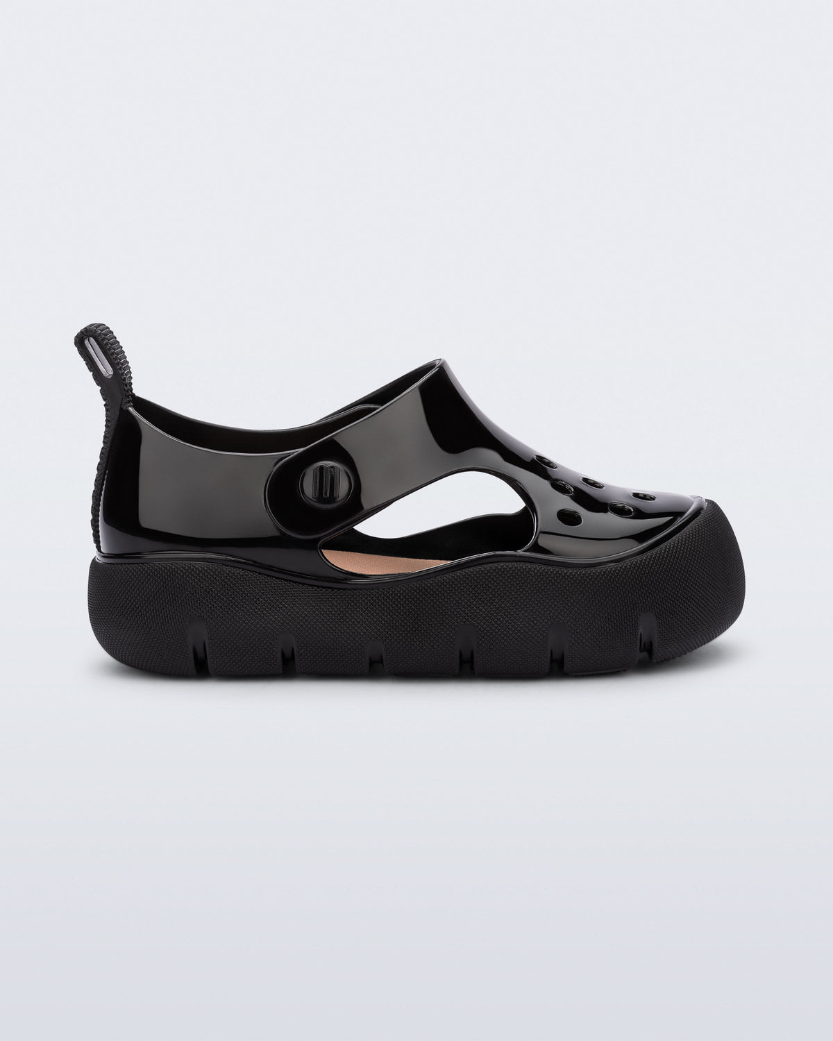 Side view of a black Bowie baby sandal.