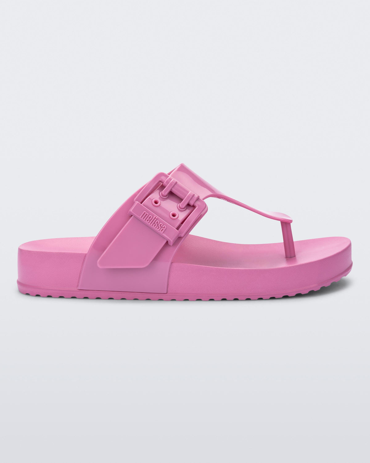 Side view of a pink Cozy Flip flop