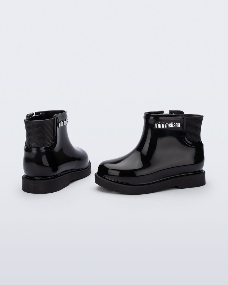 Back and side view of a pair of black Chelsea II baby boots