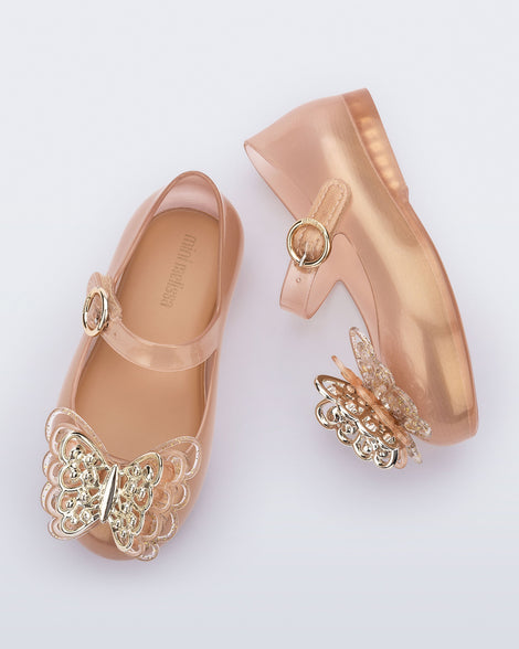 Top and side view of a pair of gold Sweet Love Butterfly baby flats