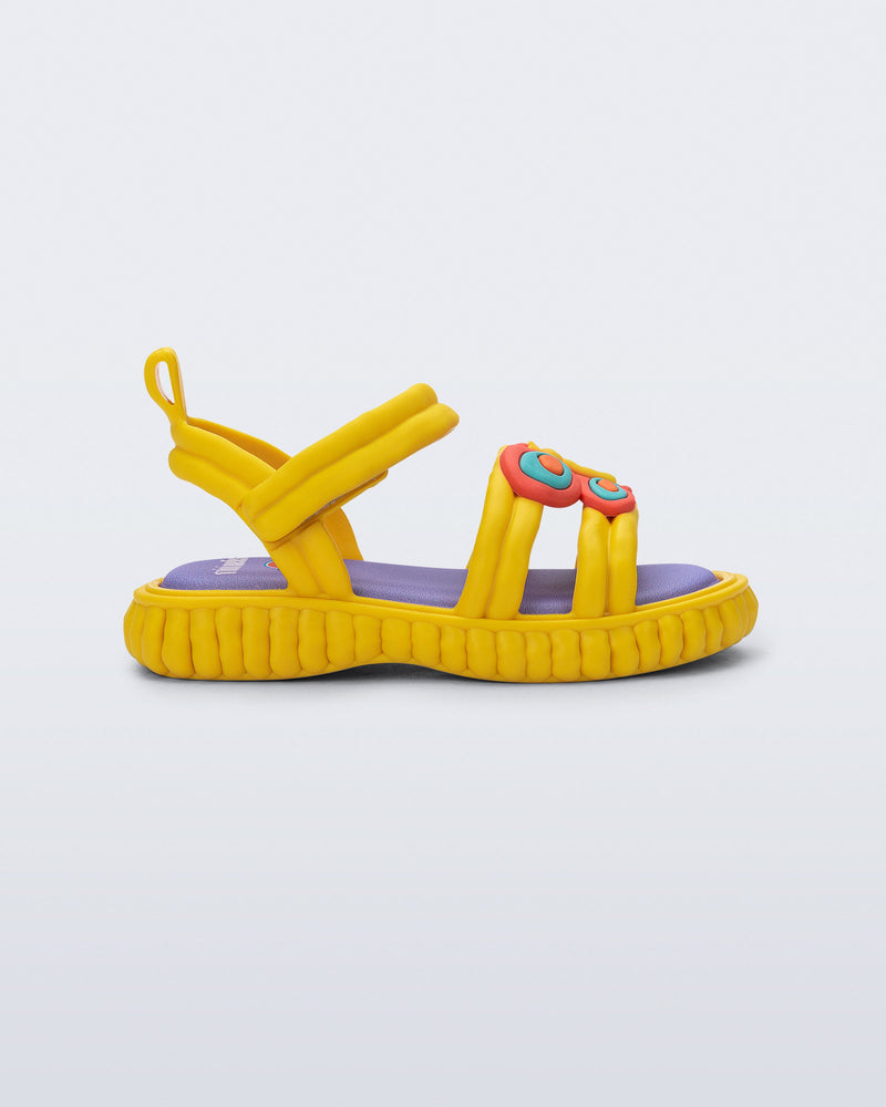 Side view of a yellow Create + Play Doh sandal