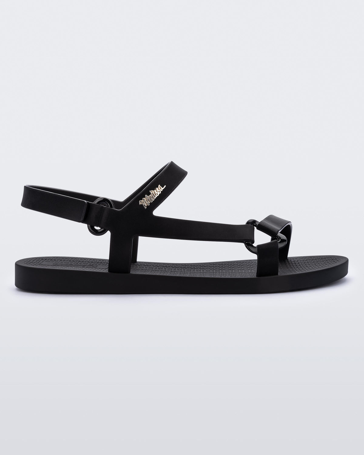 Side view of a Melissa Sun Downtown sandal in black with front cross and back ankle straps