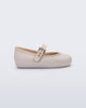 Side view of a beige Soft Ballerina baby flat with Velcro strap