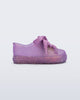 Side view of a glitter lilac baby Hip Sneaker with lilac laces