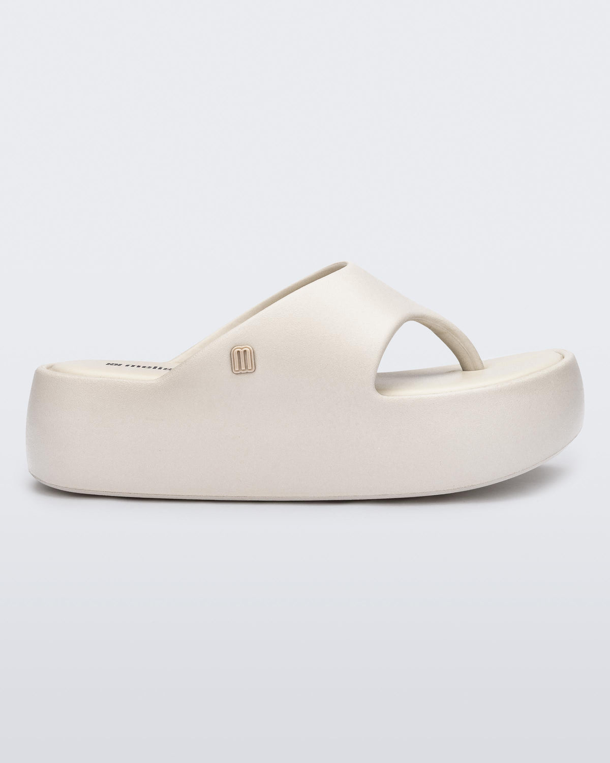 Side view of a beige Free Platform Thong sandal