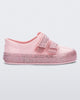 Side view of a Pink/Pink Glitter Mini Melissa Beanny Bugs sneaker with a pink base, two shiny pink velcro straps and a pink glitter sole.