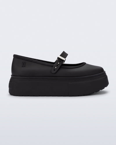 Side view of a black Soft Ballerina Platform flats