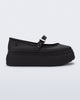 Side view of a black Soft Ballerina Platform flats