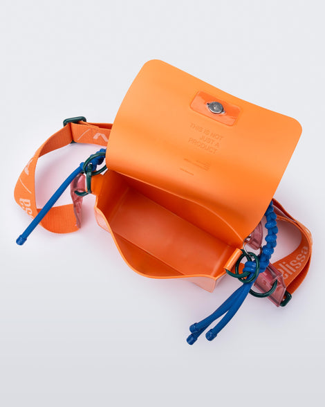 Top view of an orange Olga Bag + Alexandre Pavao with blue short strap fabric long  strap