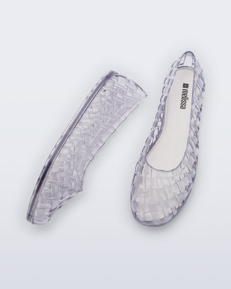 Top and side view of a pair of clear Possession Ballerina flats