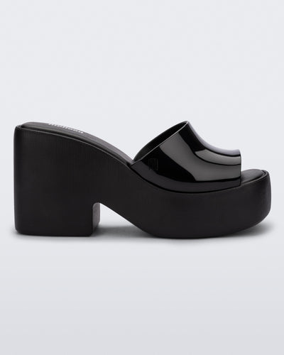 Side view of the Melissa Posh platform slide in Black