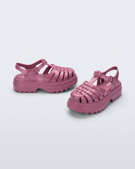 Side and front angled view of a pair of lilac Possession Platform II fisherman sandals