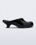 Side view of a black Gaia kitten heel with peep toe