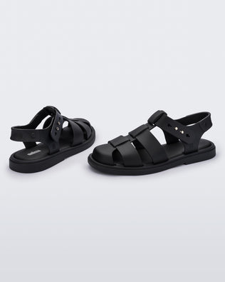 Back and side angled view of a pair of black Emma women's sandals.