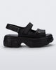Side view of a black Ella Move platform sandal
