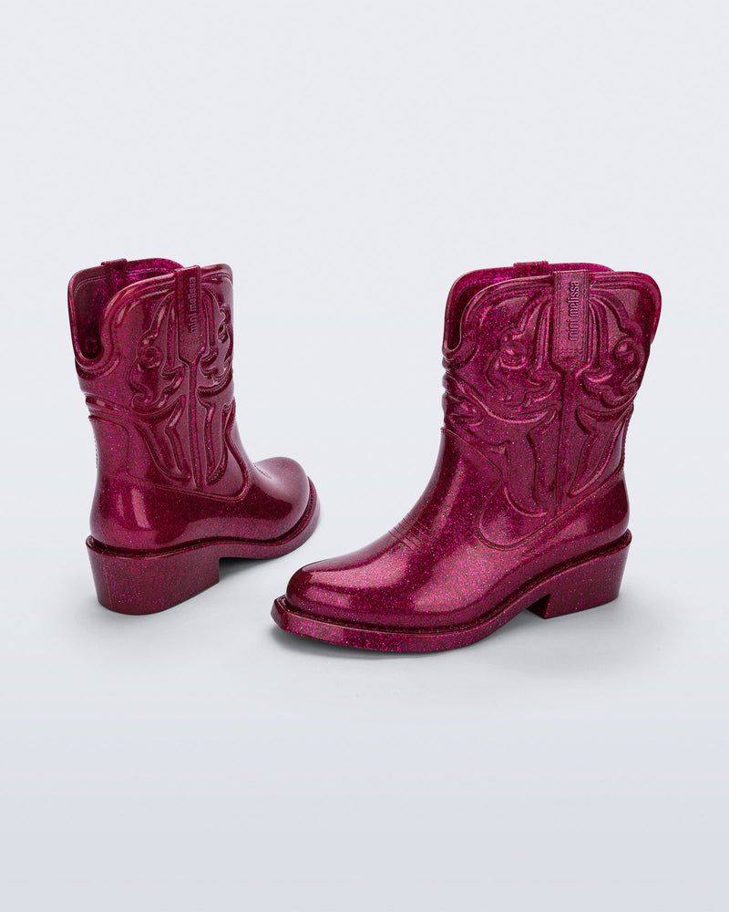 Back and side view of a pair of glitter pink Texas kids boots
