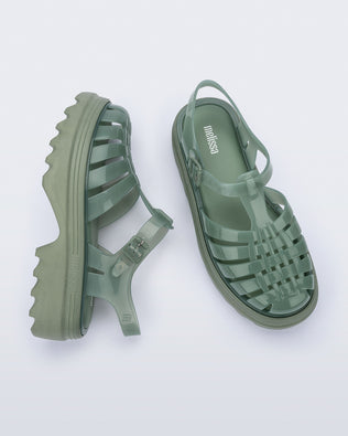 Side and top view of a pair of green Possession Platform II sandals.
