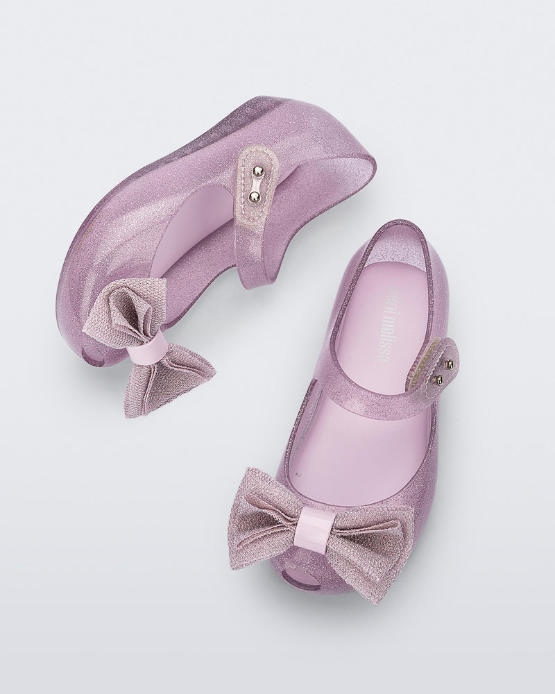 Top and side view of a pair of pink glitter Ultragirl Sweet baby ballerina flats