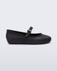 Side view of a black Soft Ballerina kids flat with strap