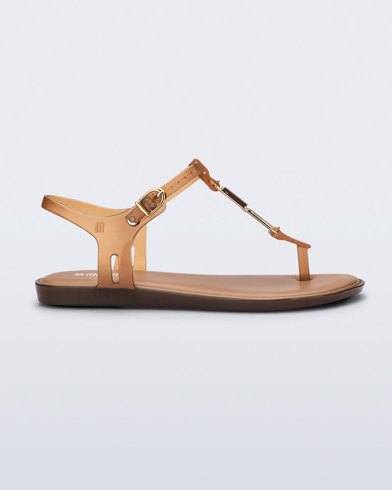 Side view of a brown Solar M Chic sandal