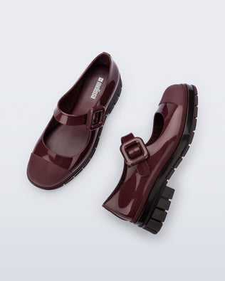 Top and side  view of a pair of burgundy June mary janes with matte toe cap