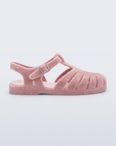 Side view of a pink fuzzy Possession Warm fisherman sandal with fuzzy insole