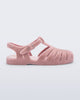Side view of a pink fuzzy Possession Warm fisherman sandal with fuzzy insole