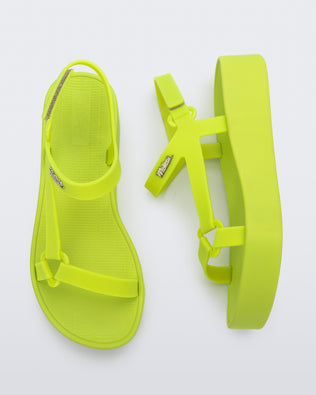 Top and side view of a pair of green Sun Downtown Platform sandals
