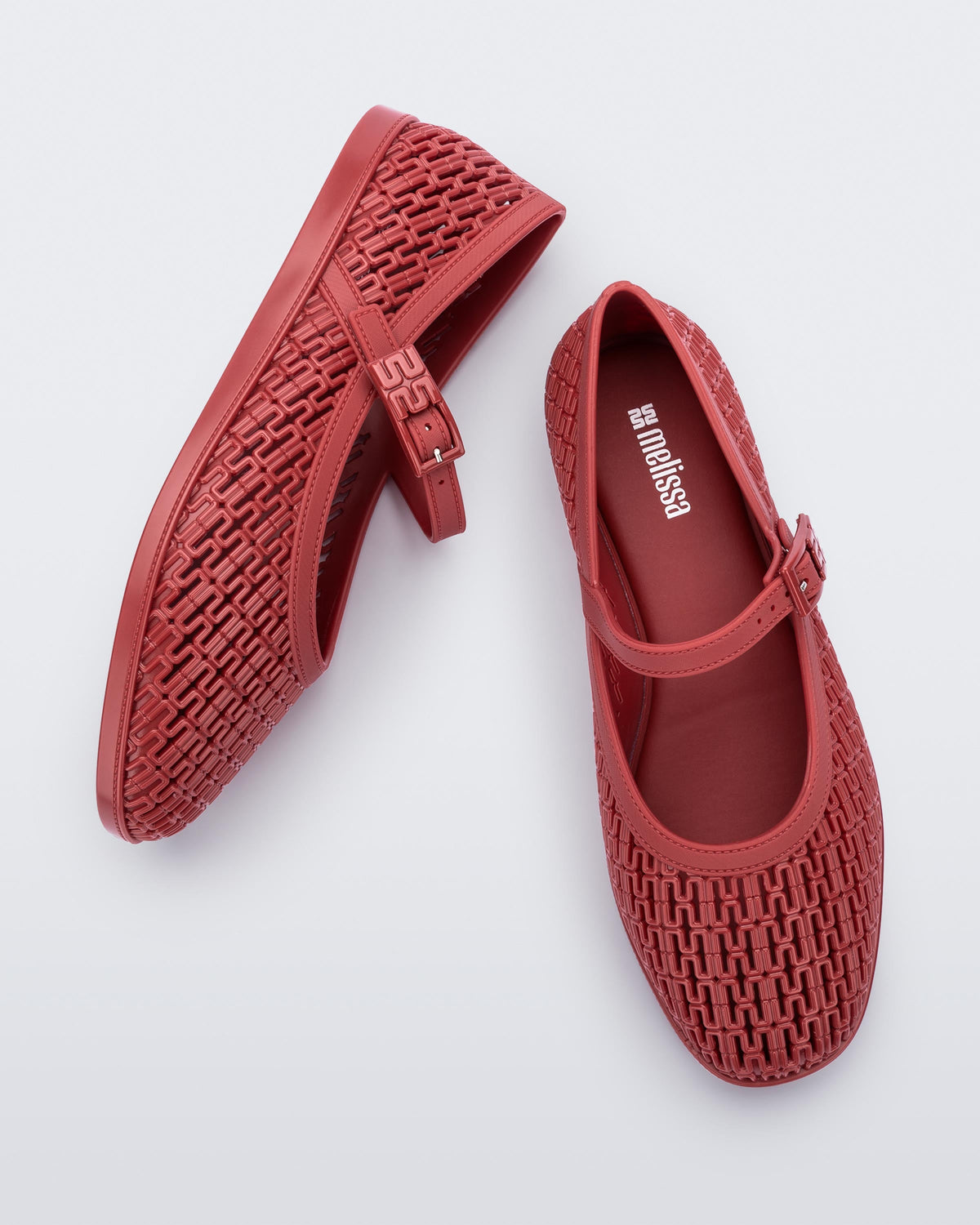 Top and side view of a pair of red Harper ballet flats with top strap with buckle