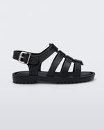 Side view of a black Mini Melissa Flox sandal with straps with straps.