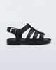 Side view of a black Mini Melissa Flox sandal with straps with straps.