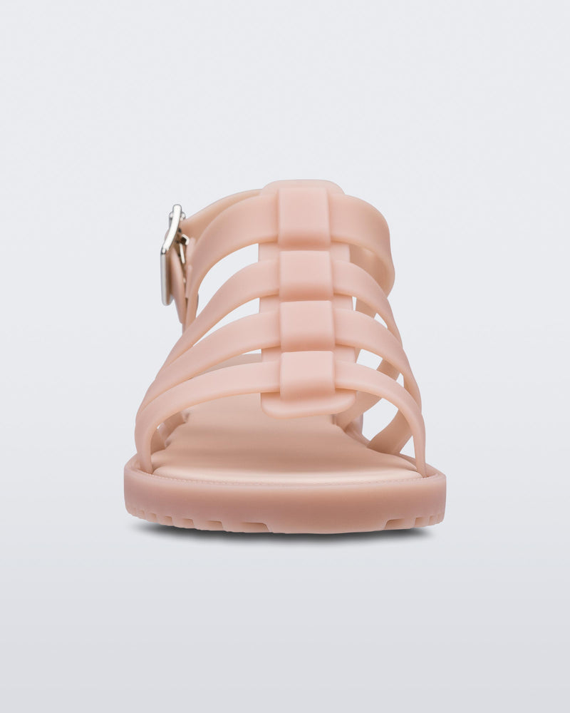 A front view of a pink Melissa Flox sandal with straps.