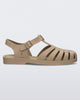 Side view of a Dark Beige Melissa Possession sandal with several straps and a closed toe front.