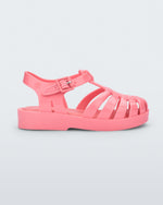 Side view of a light pink Possession baby fisherman sandal.