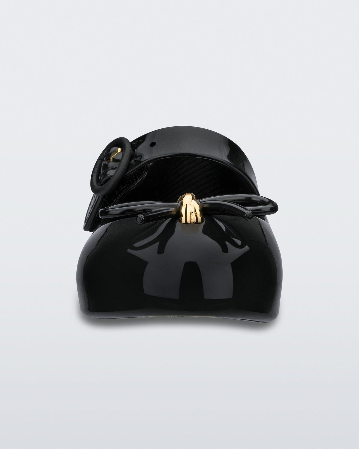 Front view of a black Mini Melissa Sweet Love flat with a top strap and a bow detail on the toe.