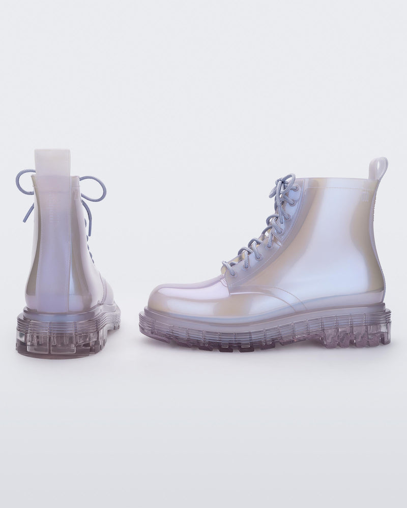 Side and back view of a pair of a pearly lilac Melissa Coturno boots.