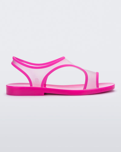 Side view of a transparent neon pink Melissa Bikini Sandal with two transparent pink straps conjoining in the middle and a pink insole.
