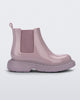 side view of a Melissa Step slip on ankle boot in Lilac with lug sole. 
