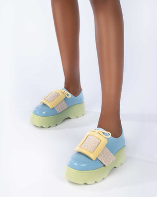 Product element, title Buckle Up Kick Off in Green/Blue/Yellow
 price €51,20