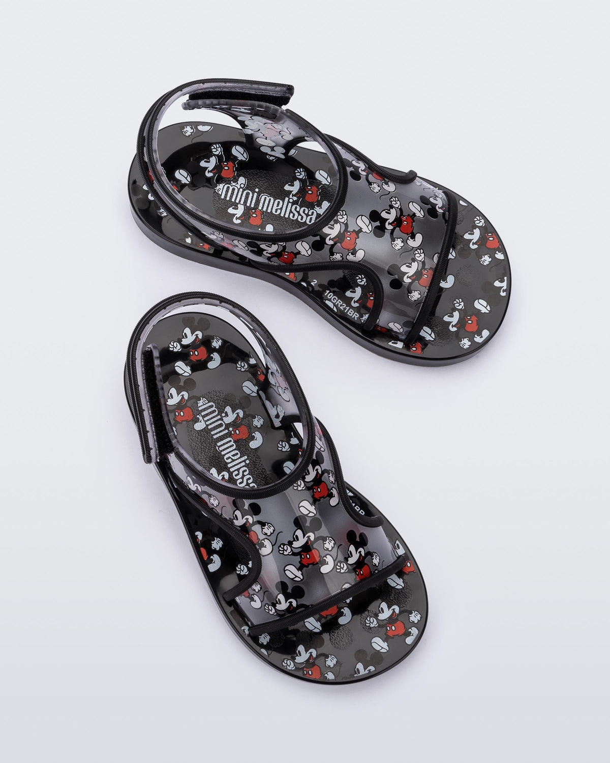 Top view of a pair of black Mini Melissa Acqua sandals with Mickey Mouse print