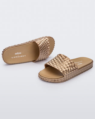 Product element, title Court Slide in Gold
 price €58,00