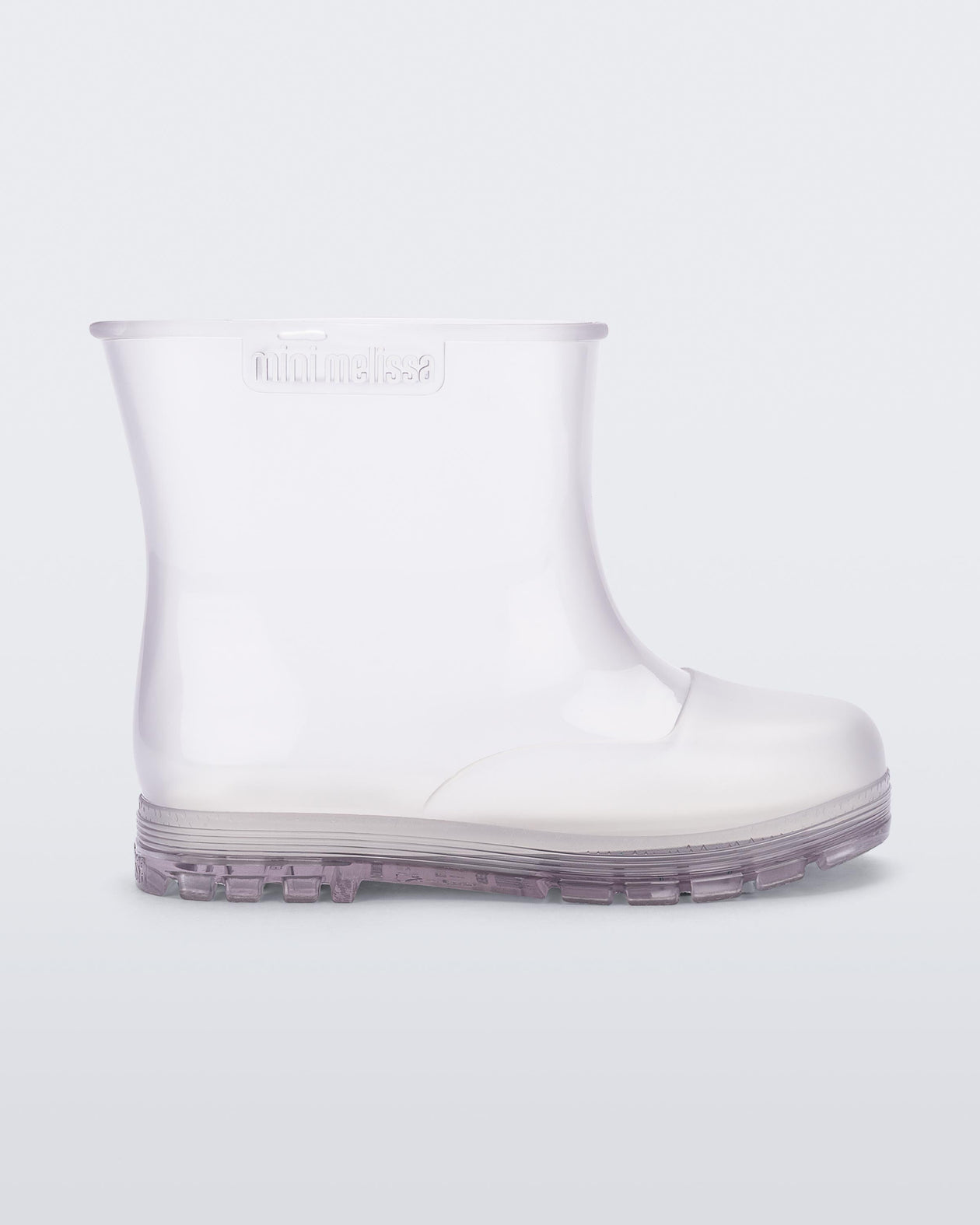 Side view of a clear baby Melissa Welly boot.