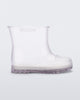 Side view of a clear baby Melissa Welly boot.