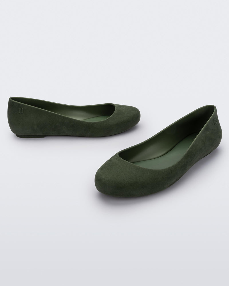 Angled view of a pair of green flocked Melissa Sweet Love Basic Velvet flats.