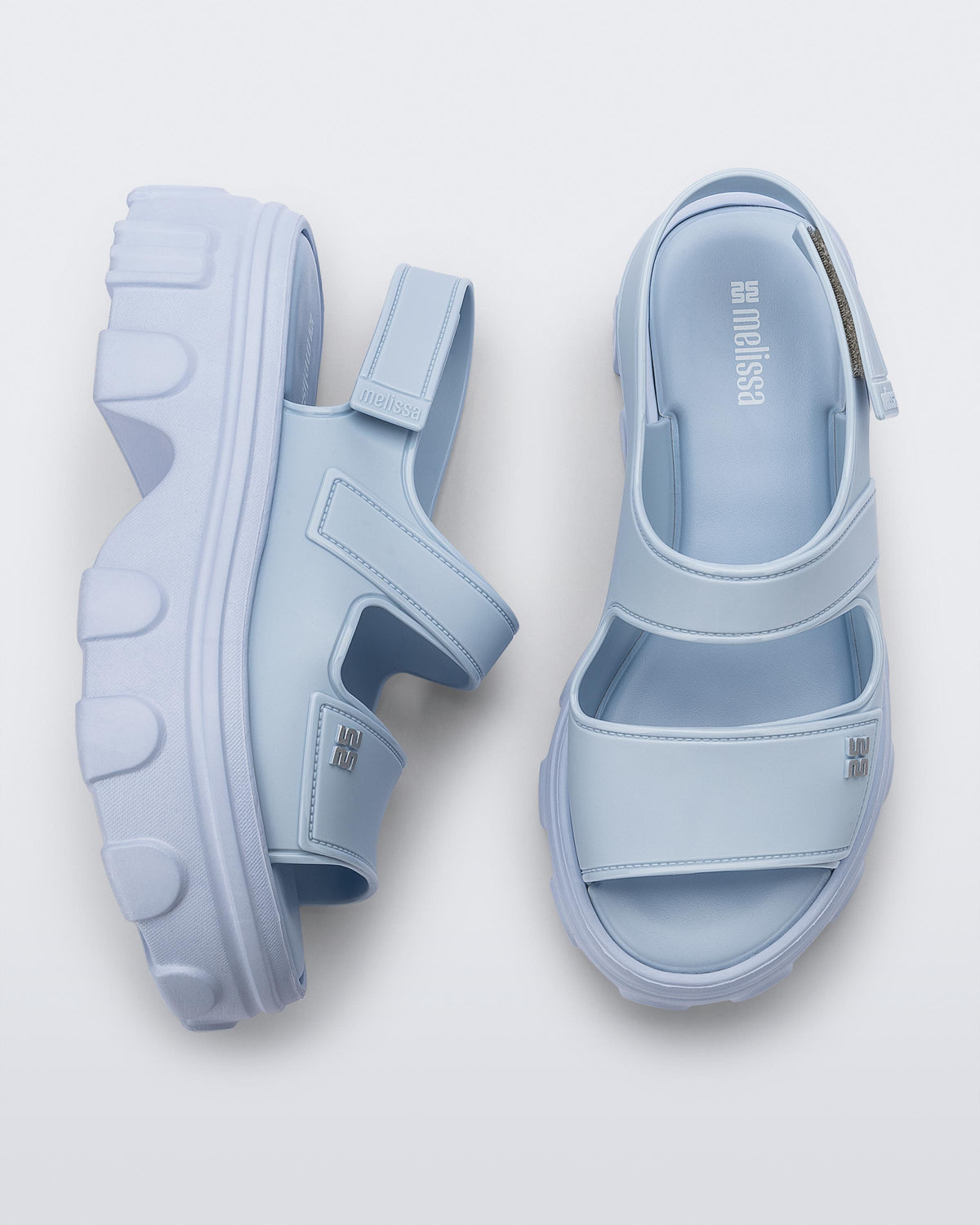 Top and side view of a pair of Ella Move platform sandals.