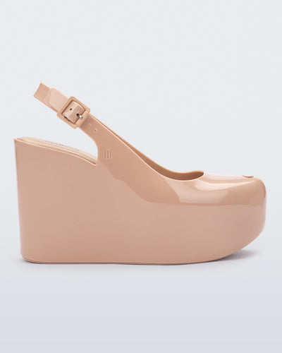 Side view of a beige Melissa Groovy wedge platform slingback heel with peep toe. 