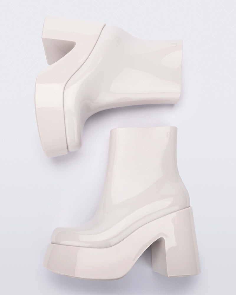 Top view of a pair of white Melissa Nubia  platform heel boots.